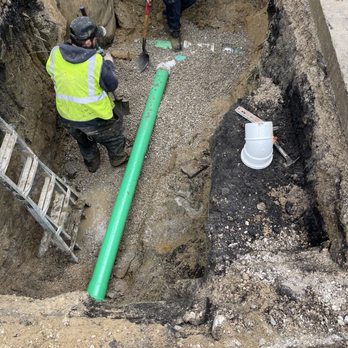 Windy City Rooter - two men working in a trench - Plumbing Near Me - Antioch, Illinois Windy City Rooter - two men working in a trench - Plumbing Near Me - Antioch, Illinois