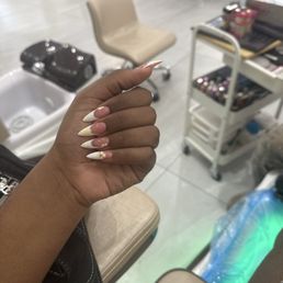 This was Polly gel with white French tip with butter yellow flowers This was Polly gel with white French tip with butter yellow flowers