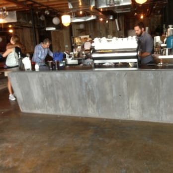 Cartel Roasting Co - A view of the entrance and bar.  Cool place. - Cafes Near Me - Tucson, Arizona