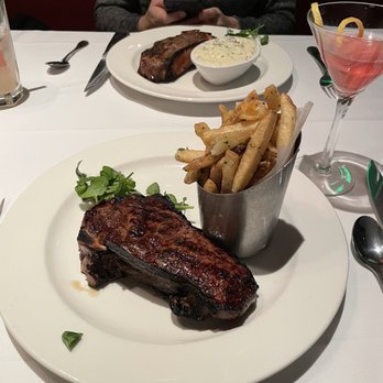 The Capital Grille - Bone-In Dry Aged NY Strip 14oz with Parmesan Truffle Fries - Steakhouses Near Me - Paramus, New Jersey The Capital Grille - Bone-In Dry Aged NY Strip 14oz with Parmesan Truffle Fries - Steakhouses Near Me - Paramus, New Jersey