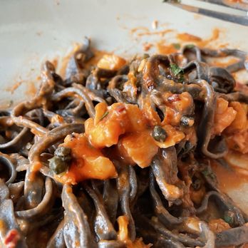 Nonna Osteria - 1604 San Antonio - Tagliolini Al Nero. I was being beckoned by my dish to eat, so I did. It could have used a bit more heat (spice) but still very yummy! - Italian Near Me - San Antonio, Texas Nonna Osteria - 1604 San Antonio - Tagliolini Al Nero. I was being beckoned by my dish to eat, so I did. It could have used a bit more heat (spice) but still very yummy! - Italian Near Me - San Antonio, Texas