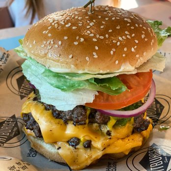 Fatburger - a hamburger with cheese, lettuce, tomato, and onion - Burgers Near Me - Langley City, British Columbia Fatburger - a hamburger with cheese, lettuce, tomato, and onion - Burgers Near Me - Langley City, British Columbia