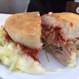 Lomito completo: pork tenderloin with homemade sauerkraut + tomatoes + copious amounts of mayo Lomito completo: pork tenderloin with homemade sauerkraut + tomatoes + copious amounts of mayo
