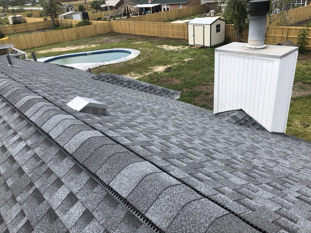 Slide of Old Town Roofing