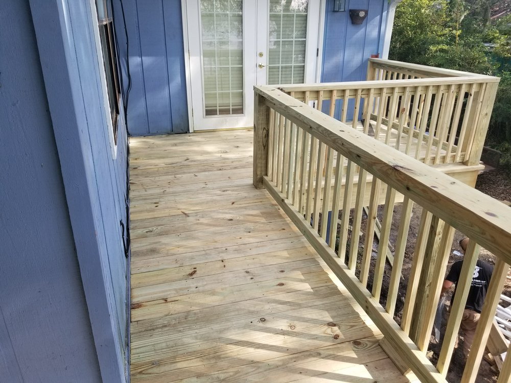 Slide of Hoss Cats Construction