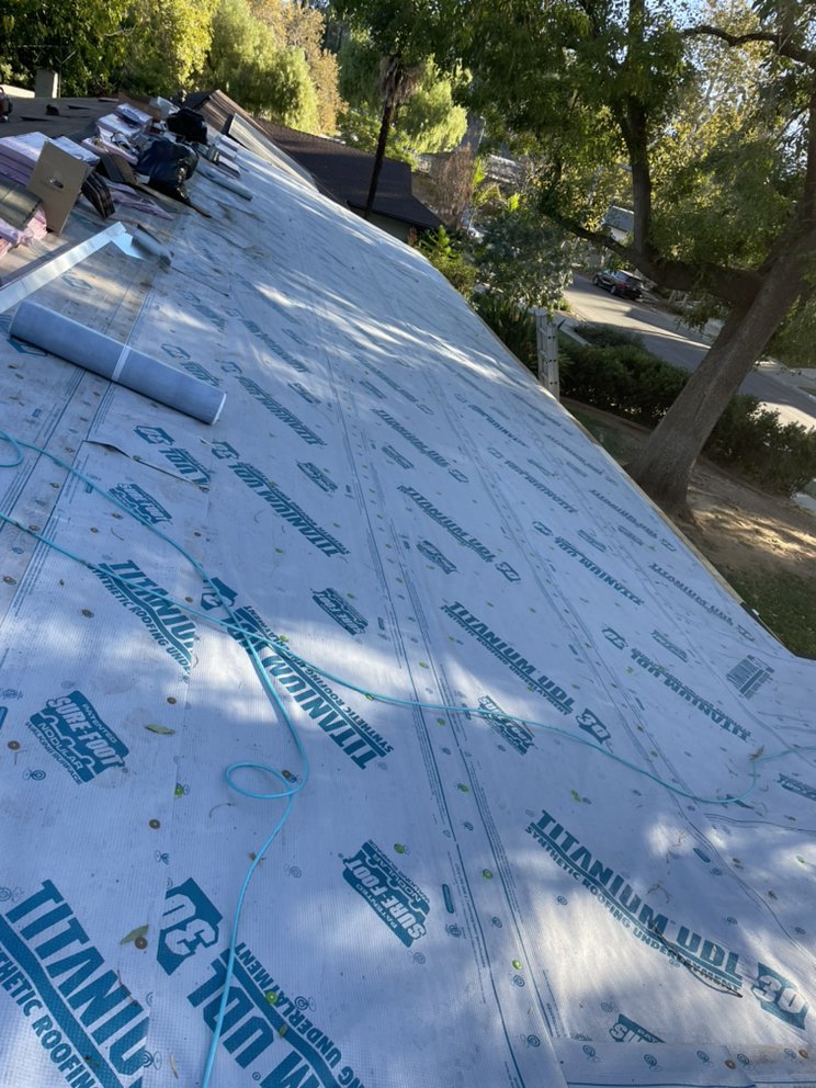 Slide of Prestige Roofing Service