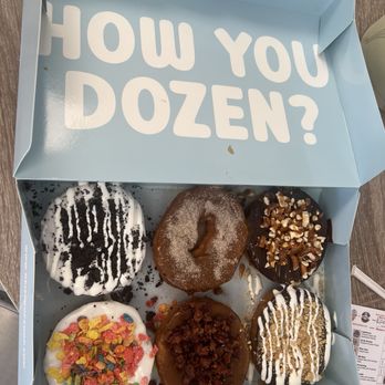 OKI Scoop Shop And Donuts - Top left - right: cookies and cream, French toast, chocolate pretzel  Bottoms left - right: tootie fruity, bacon me crazy, s'mores - Ice Cream & Frozen Yogurt Near Me - Oak Island, North Carolina