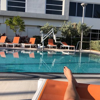 Aloft by Marriott Miami Airport - Poolside on this perfect Miami evening. - Hotels Near Me - Miami, Florida Aloft by Marriott Miami Airport - Poolside on this perfect Miami evening. - Hotels Near Me - Miami, Florida
