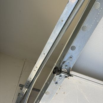 Spot On Garage Doors Service's - Wheel off track - Garage Door Services Near Me Spot On Garage Doors Service's - Wheel off track - Garage Door Services Near Me