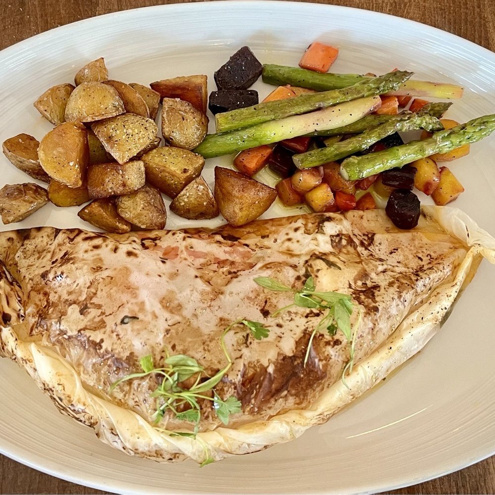 Acquario Italian Restaurant - Branzino in parchment paper before opening - Italian Near Me - Keller, Texas