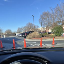 You cannot circle the building if you can't get in line. You have to leave the parking lot. You cannot circle the building if you can't get in line. You have to leave the parking lot.