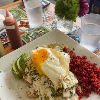 Cafe Xochimilco - Green Sauce Chilaquiles with Eggs & Meat (Chorizo) - Breakfast & Brunch Near Me - Long Island City, New York Cafe Xochimilco - Green Sauce Chilaquiles with Eggs & Meat (Chorizo) - Breakfast & Brunch Near Me - Long Island City, New York