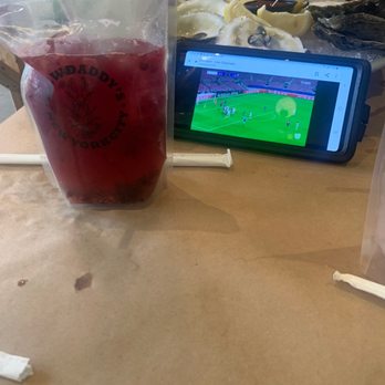 Claw Daddy's - Matilda Mardi Gras drink and Champions League on the phone - Cajun/Creole Near Me - New York, New York