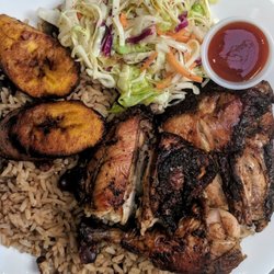 The Caribbean Kitchen - Jerk Chicken served with Rice and Peas, Cole Slaw and Ripe Plantains