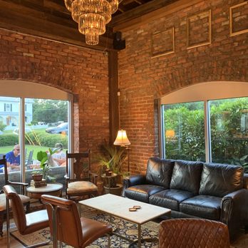 Neat & Sweet - a living room with a chandelier - Desserts Near Me - Apex, North Carolina Neat & Sweet - a living room with a chandelier - Desserts Near Me - Apex, North Carolina