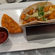 Photo of Bar Bombón - Philadelphia, PA, United States. Lunch Combo: Philly Steak Empanada (side) + Buffalo Caulif lower Taco (classic)