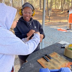 Five Rings Armory - Trainee's helping each other