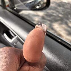 K & N Nails - Right thumb cracked.