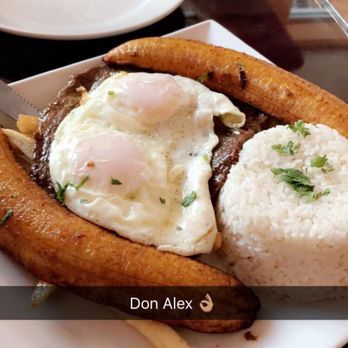 Don Alex Restaurant - a plate of food with fried eggs and french fries - Peruvian Near Me - Elizabeth, New Jersey Don Alex Restaurant - a plate of food with fried eggs and french fries - Peruvian Near Me - Elizabeth, New Jersey