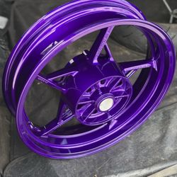 Jimmy Rivers Performance Works - After: purple powder coated motorcycle rim