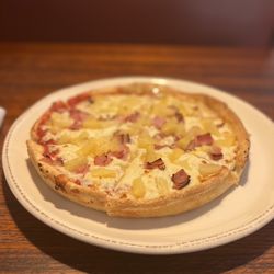 Basil's Restaurant & Pizzeria - Pineapple and ham pizza.