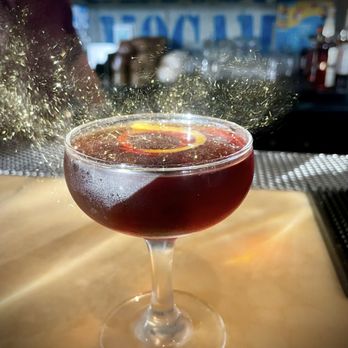 Mortar & Pestle Bar - Applewood-smoked black Manhattan with gold glitter dust - Cocktail Bars Near Me - San Jose, California Mortar & Pestle Bar - Applewood-smoked black Manhattan with gold glitter dust - Cocktail Bars Near Me - San Jose, California