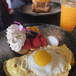 Fried egg over bacon omelette. Delicious! Fried egg over bacon omelette. Delicious!
