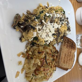 Zevi Cafe and Bistro - Zevi Scramble Eggs with lots of mushrooms, house potatoes and wheat toast - Breakfast & Brunch Near Me - San Francisco, California Zevi Cafe and Bistro - Zevi Scramble Eggs with lots of mushrooms, house potatoes and wheat toast - Breakfast & Brunch Near Me - San Francisco, California