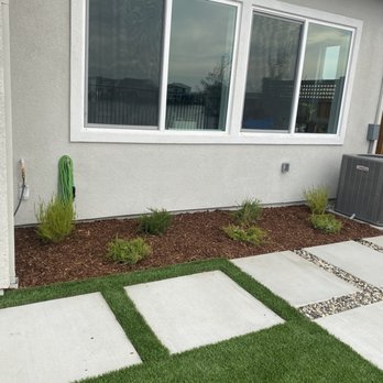 C & J Landscape Service - Square concrete with mixture of grass, gravel, and mulch. - Landscaping Near Me C & J Landscape Service - Square concrete with mixture of grass, gravel, and mulch. - Landscaping Near Me