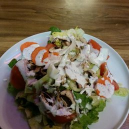 The dinner salad I made from their salad bar topped with their ranch dressing. The dinner salad I made from their salad bar topped with their ranch dressing.