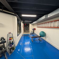 Weight room - view of weights and benches