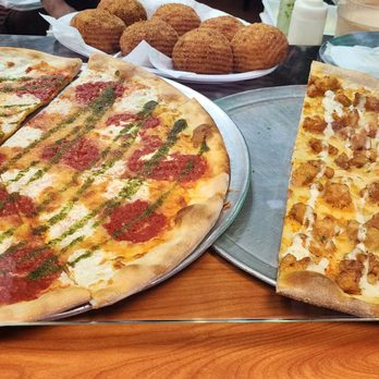 DoughBoyz Pizza - Grandma's round, buffalo chicken, aranci in background - Pizza Near Me - Oviedo, Florida