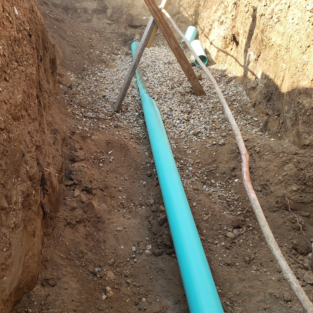 Slide of Dev's Excavating