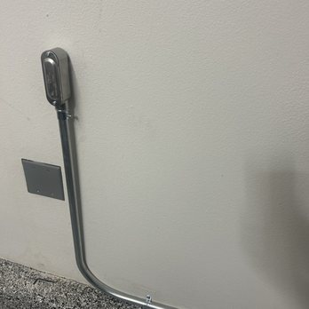 A-EV Installs - Junction where the electrical wire goes from the garage to the outside of the house where the electrical box resides - Electricians Near Me A-EV Installs - Junction where the electrical wire goes from the garage to the outside of the house where the electrical box resides - Electricians Near Me