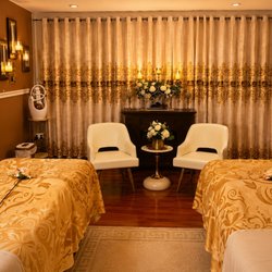 Hands On HealthCare Massage Therapy and Wellness Day Spa - Private couples massage suite at Hands On HealthCare in Commack, prepared for two.