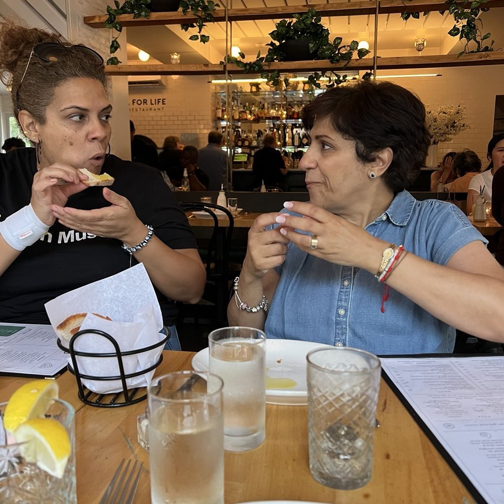 Fumo - Mercedes & Julie enjoying their bread - Italian Near Me - New York, New York