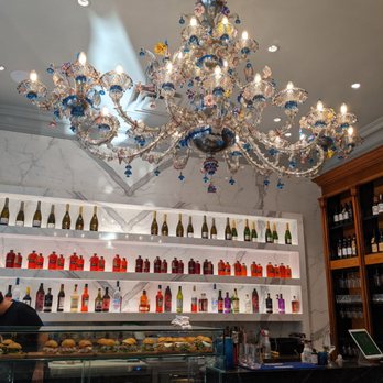 David Rocco Bar Aperitivo - a chandelier in the background - Bars Near Me - Toronto, Ontario