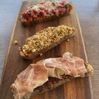 Sugo Trattoria - Bruschetta!! So amazing! You get to pick 3 out of about 10 types. SO good! - Italian Near Me - Petaluma, California Sugo Trattoria - Bruschetta!! So amazing! You get to pick 3 out of about 10 types. SO good! - Italian Near Me - Petaluma, California