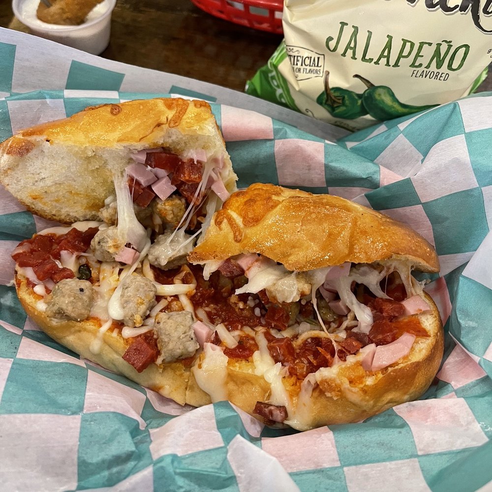 Red River Pizzeria - Stromboli on cheese bread - Pizza Near Me - Nocona, Texas Red River Pizzeria - Stromboli on cheese bread - Pizza Near Me - Nocona, Texas