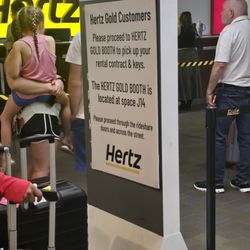 Sign at the rental counter for Gold Plus Rewards members.