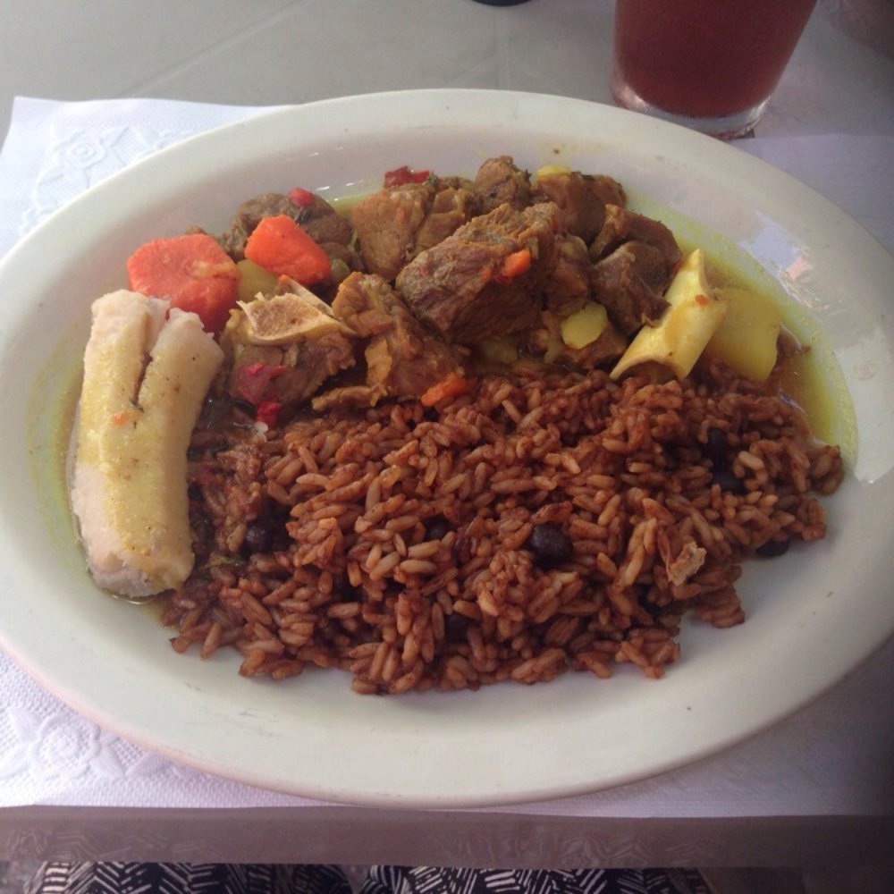 Kim's - Curried goat and rice - Caribbean Near Me - Christiansted, Virgin Islands Kim's - Curried goat and rice - Caribbean Near Me - Christiansted, Virgin Islands