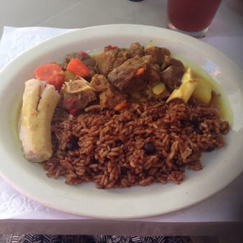 Kim's - Curried goat and rice - Caribbean Near Me - Christiansted, Virgin Islands Kim's - Curried goat and rice - Caribbean Near Me - Christiansted, Virgin Islands