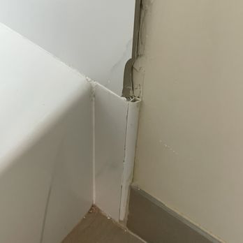 Comfort Inn Binghamton I-81 - Chipped tile by shower - Hotels Near Me - Binghamton, New York