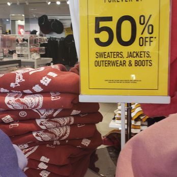 Forever 21 - Stack of Sriracha sweatshirts next to sign... somehow not part of the promo? - Women's Clothing Near Me - Long Beach, California Forever 21 - Stack of Sriracha sweatshirts next to sign... somehow not part of the promo? - Women's Clothing Near Me - Long Beach, California