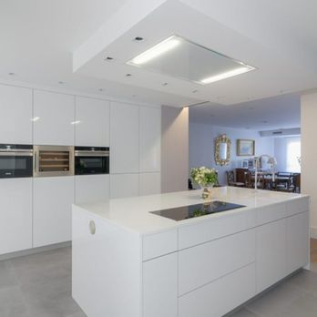 Pentagon Construction Remodel - a modern kitchen with white cabinets - General Contractors Near Me - Newport Beach, California Pentagon Construction Remodel - a modern kitchen with white cabinets - General Contractors Near Me - Newport Beach, California