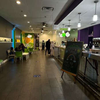 Go Greenly - a cafeteria area with tables and chairs - Juice Bars & Smoothies Near Me - Scarsdale, New York