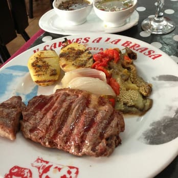 Iguazú - Entrecot con escalibada y patatas al horno - Argentine Near Me - Barcelona, B Iguazú - Entrecot con escalibada y patatas al horno - Argentine Near Me - Barcelona, B