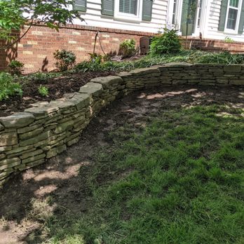 Mottern Masonry Design - Stone retaining wall rebuilt and set with mortar - General Contractors Near Me - Vienna, Virginia
