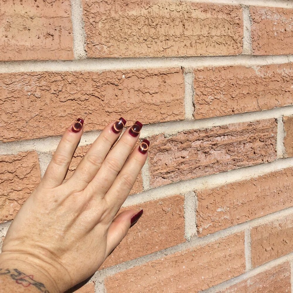Exquisite Nails - Meow!  Cat Lovers get the Cat's Eye nail polish applied at Exquisite Nails.  The process uses magnets to pull the polish into a cat's eye. - Nail Salons Near Me - Tucson, Arizona