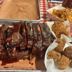 Team Carolina BBQ - Ribs platter with hush puppies, fried corn, cheese fries in the back